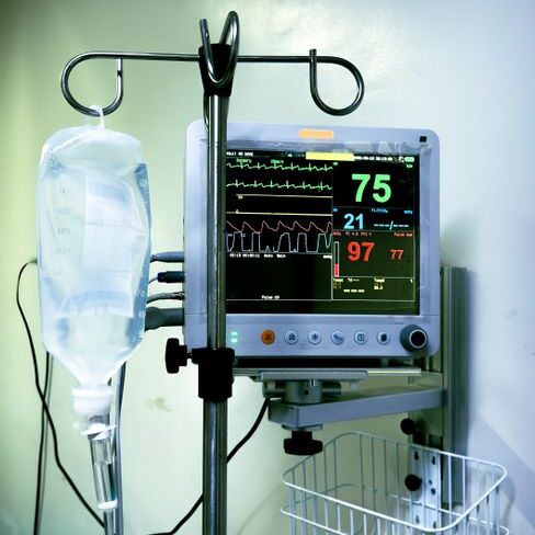 Medical equipment in use, showing vitals on a monitor next to an IV drip in a Cebu City healthcare facility.